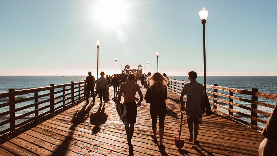 People walking on a dock