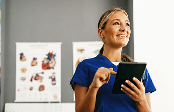 Healthcare worker on tablet