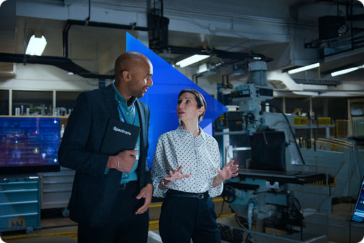 Two people in business wear talking to each other 