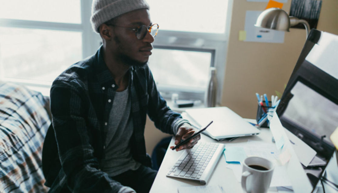 man working at laptop