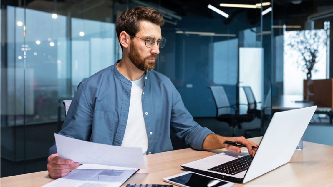 man working at laptop