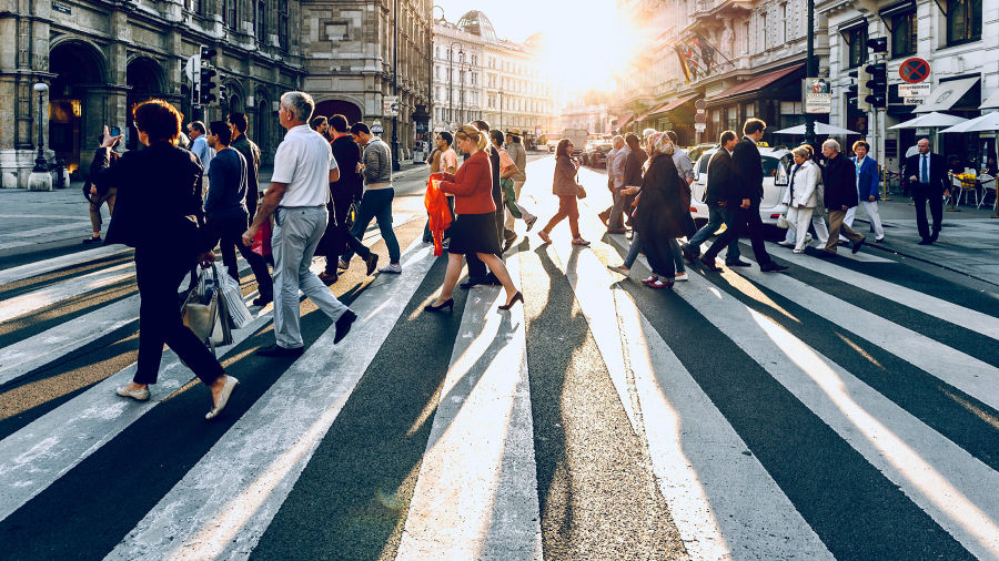 people crossing a crosswalk